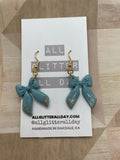 Adorable medium glitter bow dangle earring