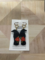 Black floral raven dangle earring