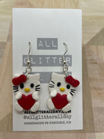 Hello Kitty holding heart dangle earring